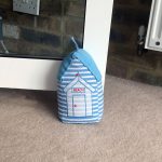Beach hut doorstop